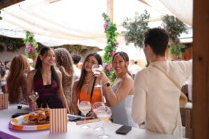 happy guests at soluna rooftop patio