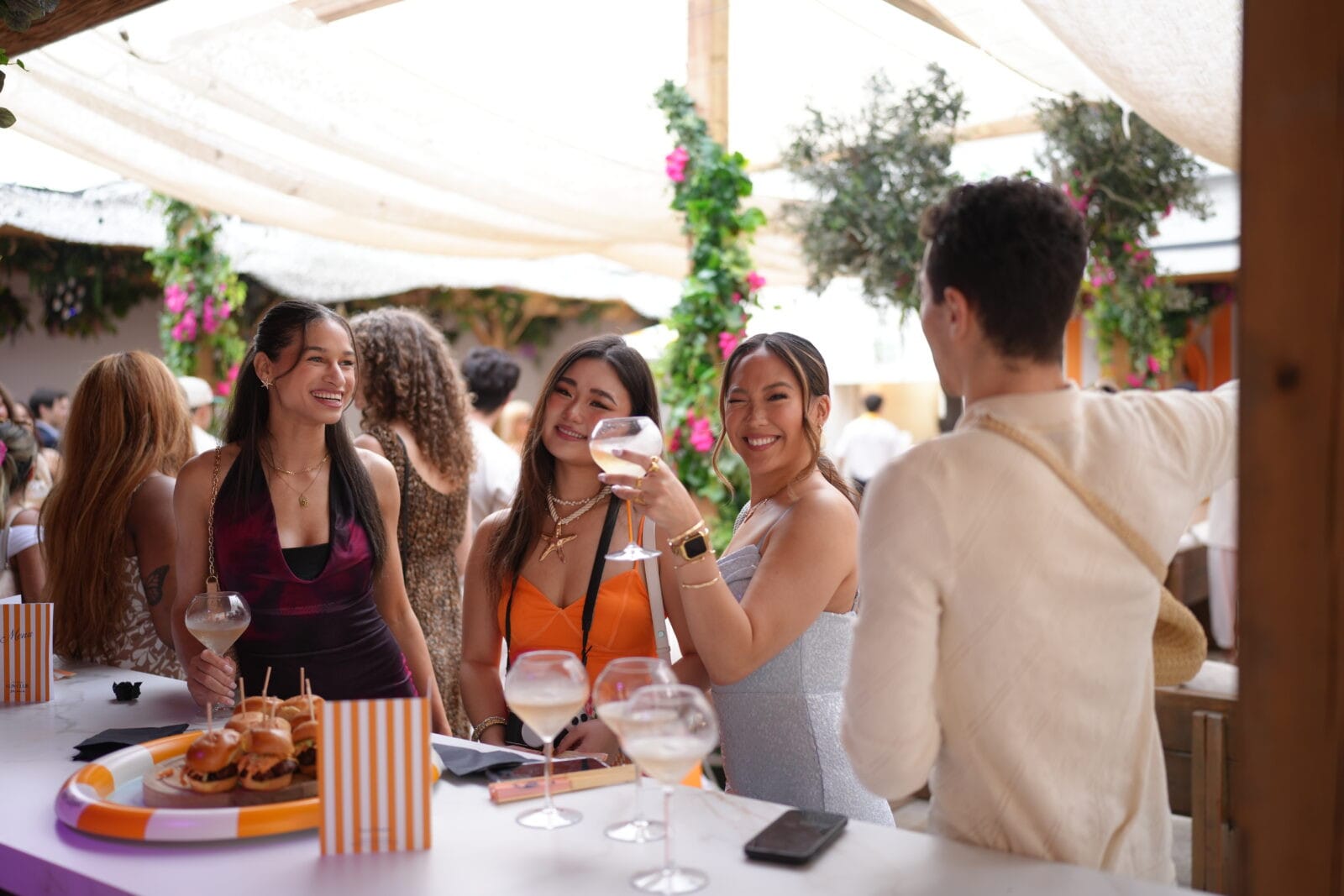 happy guests at soluna rooftop patio